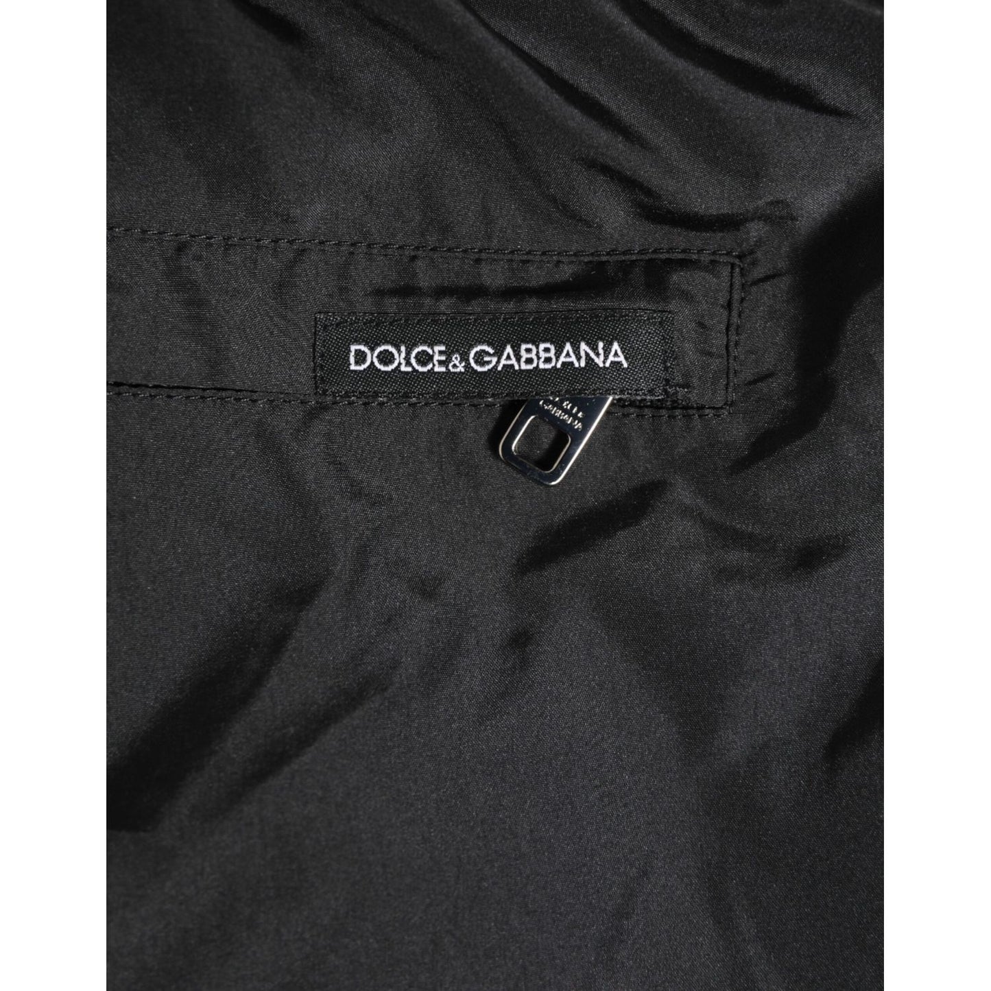 Close-up of Dolce & Gabbana Black Nylon KING Sideband Men Boxer Shorts Swimwear showing logo detail on waistband.