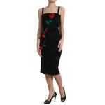 Dolce & Gabbana Black Wool Sleeveless Rose Applique Dress with 3D rose embroidery, elegant midi design, perfect for formal occasions.