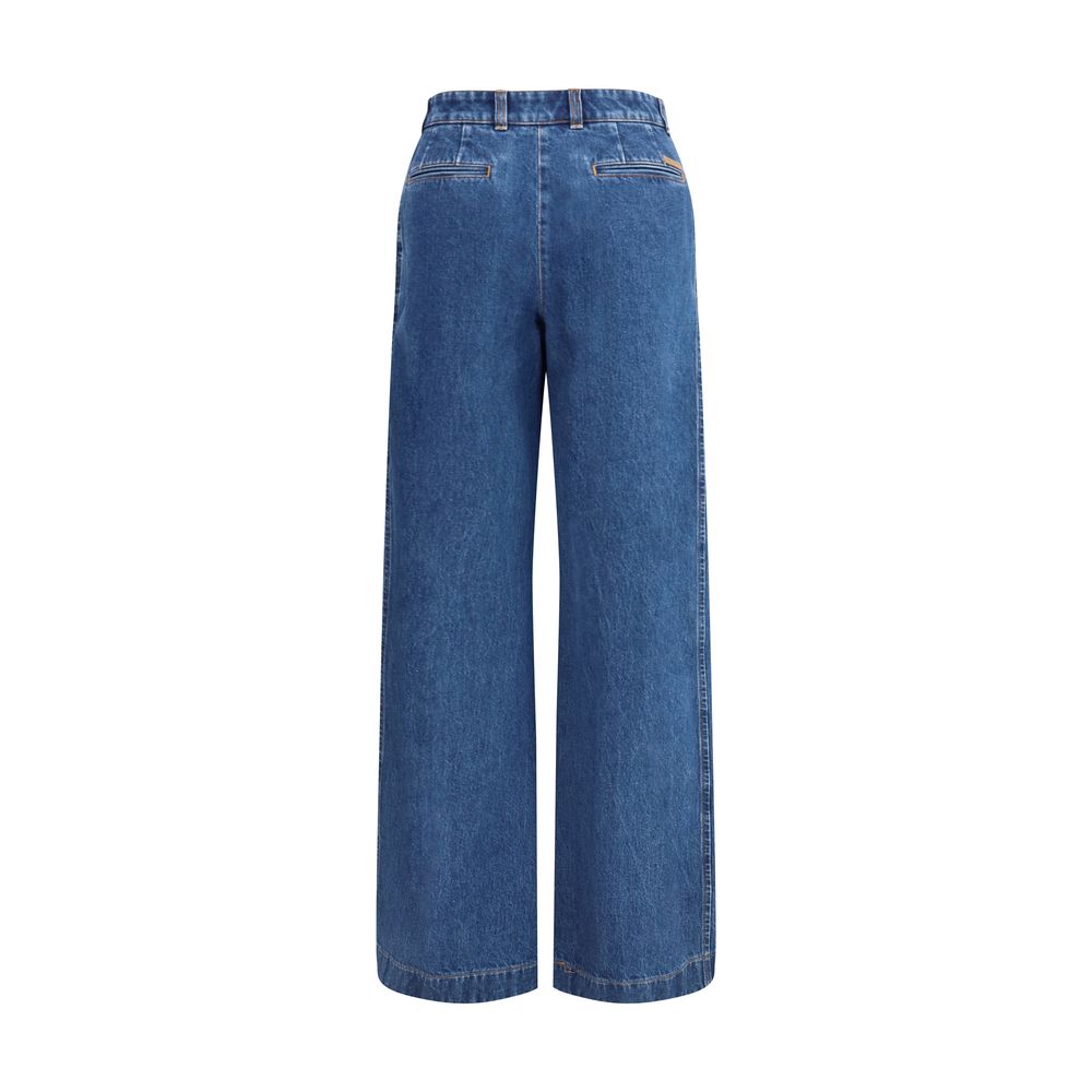 Back view of Dolce & Gabbana Blue Cotton Straight-Leg Jeans with French pockets and tailored design.