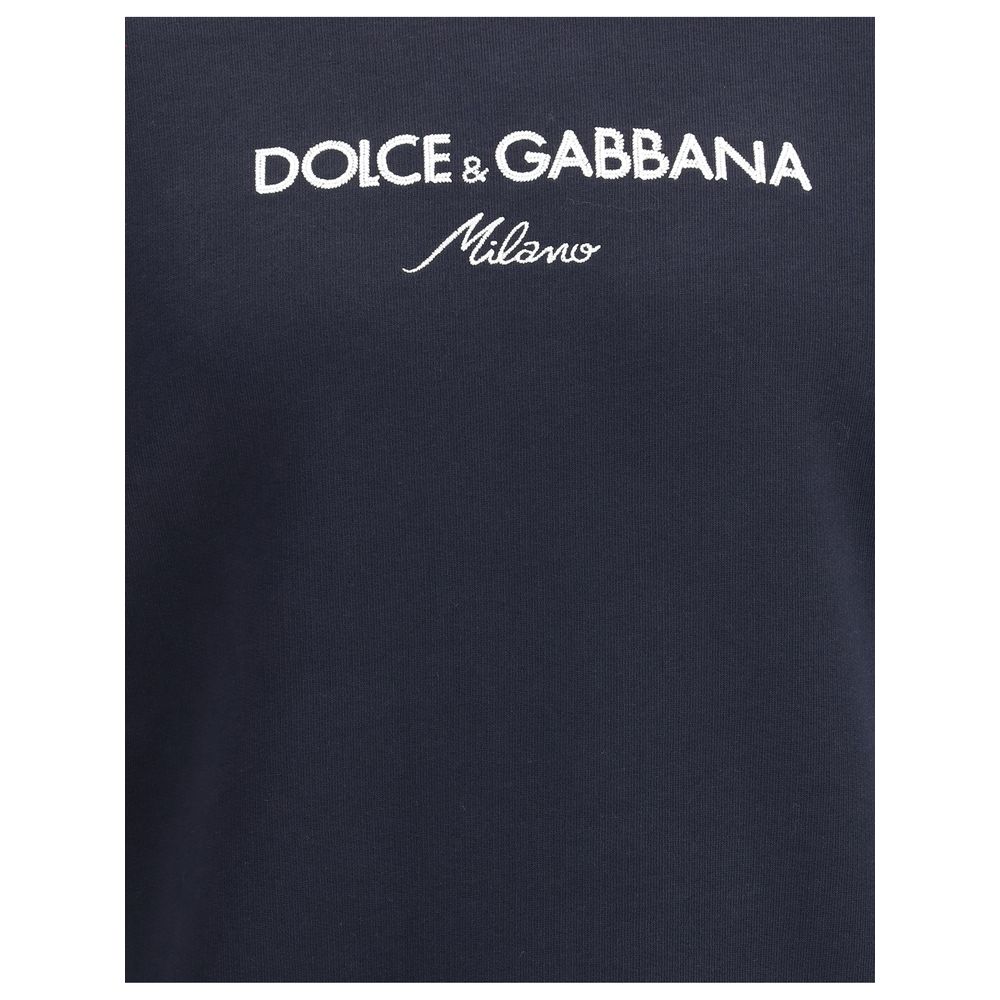 Dolce & Gabbana Blue Cotton Sweatshirt featuring logo design, ribbed crew neck, hem, and cuffs; perfect for casual iconic style.