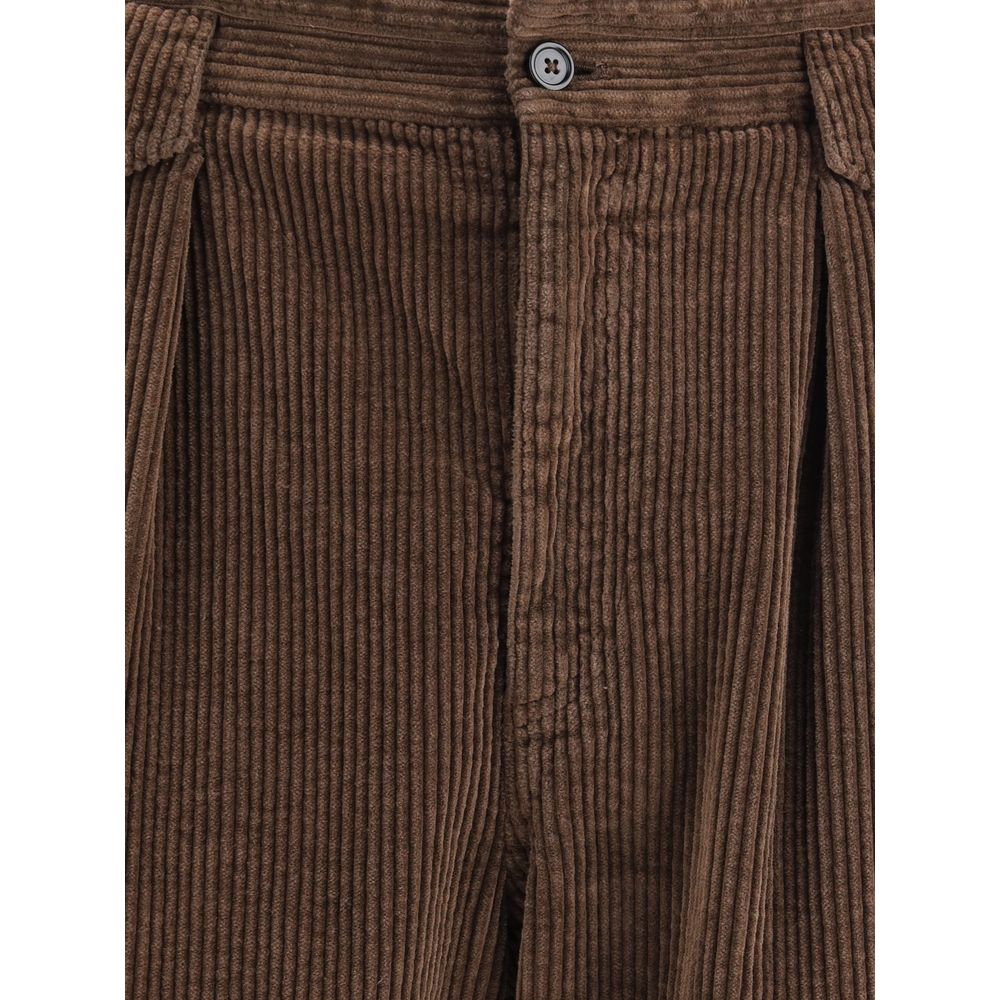 Dolce & Gabbana Brown Cotton Casual Pants close-up showing textured corduroy, zipper, and button closure for comfort and style.