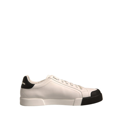 Dolce & Gabbana White Leather Logo Portofino Sneakers Shoes, side view with black accents, calf leather, rubber sole, lace-up closure.