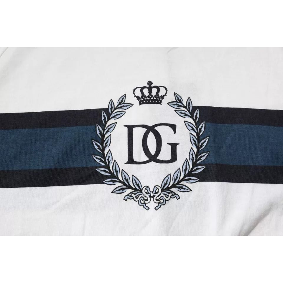 Close-up of Dolce & Gabbana White Logo Print Cotton Men Crew Neck T-shirt showing DG emblem and crown design on white cotton fabric.