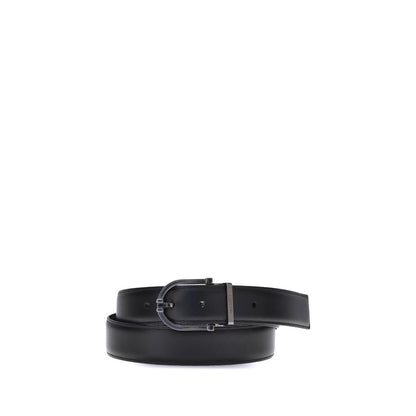 Ferragamo Black Calf Leather Bos Taurus Belt with reversible design and geometric buckle.