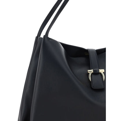 Ferragamo Black Calf Leather Bos Taurus Handbag with double flat handles and magnetic closure, featuring grained design and logo applique.