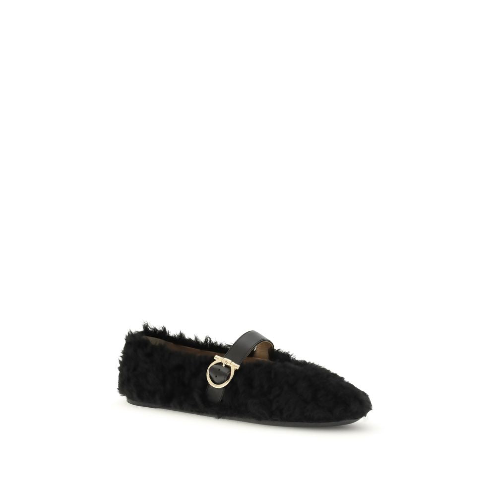 Ferragamo Black Fur Ballet Flats with Gancini buckle and shearling lining, perfect for the cold season, showcasing elegance and comfort.