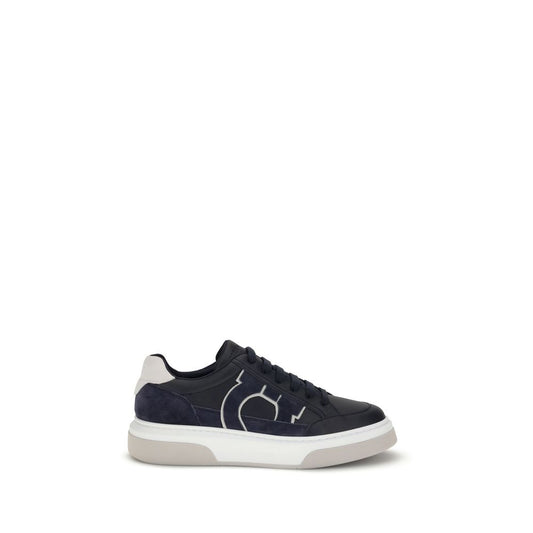 Ferragamo Blue Calf Leather Bos Taurus Low Top Sneakers with Gancini design and textured rubber sole. Stylish retro-inspired footwear.