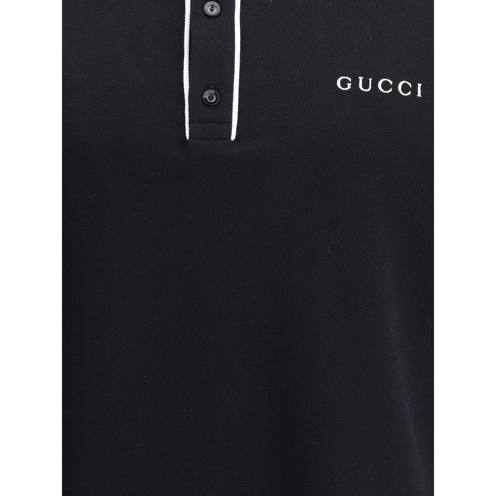 Gucci Black Cotton Polo Shirt with classic collar, buttons, and iconic monogram on chest for a sporty elegant look.