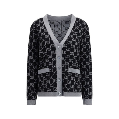 Gucci Black Wool Cardigan with GG Supreme pattern, reversible design, V-neckline, and front pockets for versatile styling.
