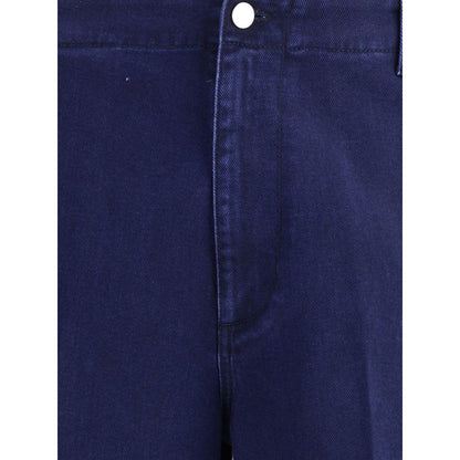 Close-up of Gucci Blue Cotton Jeans Denim showcasing button closure and fabric texture.