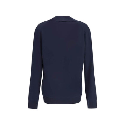 Back view of Gucci Blue Wool Sweatshirt with long sleeves and ribbed trims, showcasing relaxed elegance and subtle embroidered logo.