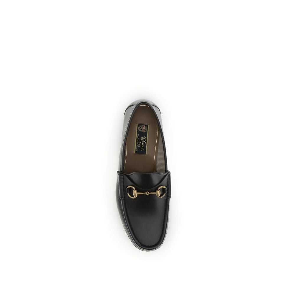 Top view of Gucci Brown Calf Leather Bos Taurus Slip-On Loafers with gold-tone Horsebit detail, part of the 1953 Collection.