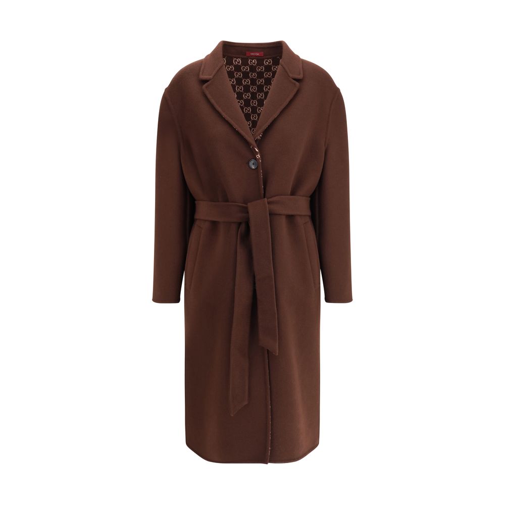 Gucci Brown Wool Coat with notch lapels, button closure, side pockets, and reversible GG pattern in silk wool.