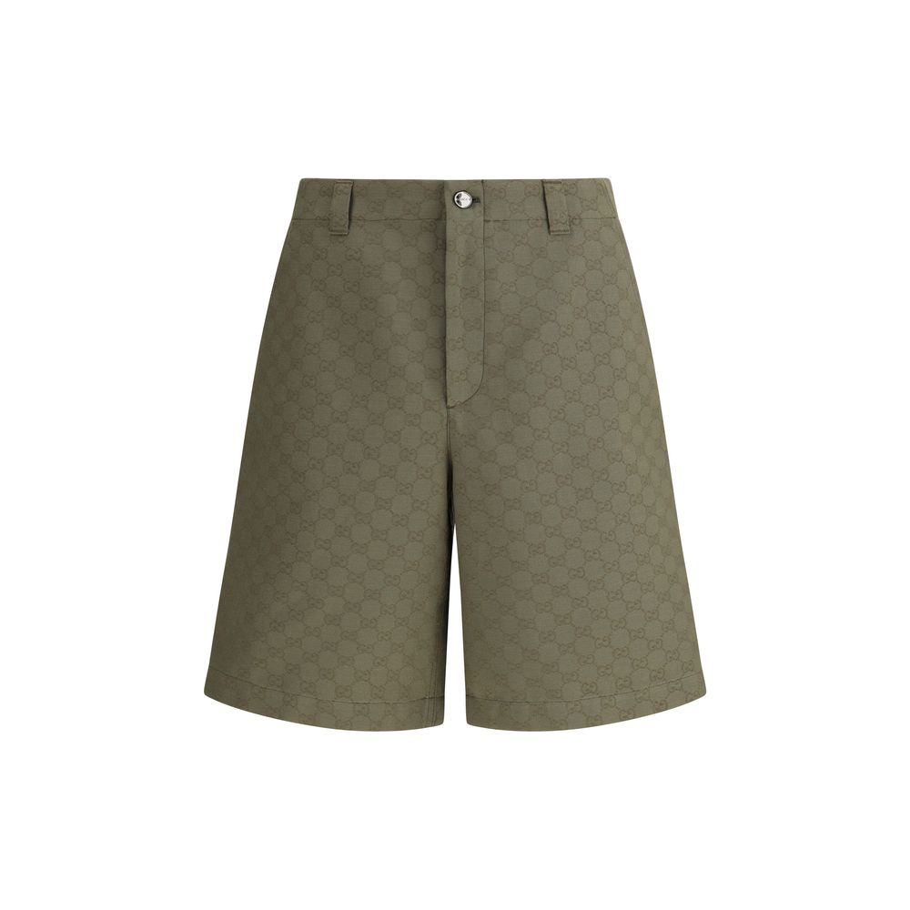 Gucci Green Cotton Bermuda Shorts with GG pattern, versatile and stylish, featuring a front zipper and button closure, perfect for AW25.