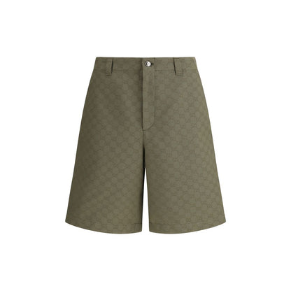 Gucci Green Cotton Bermuda Shorts with GG pattern, versatile and stylish, featuring a front zipper and button closure, perfect for AW25.