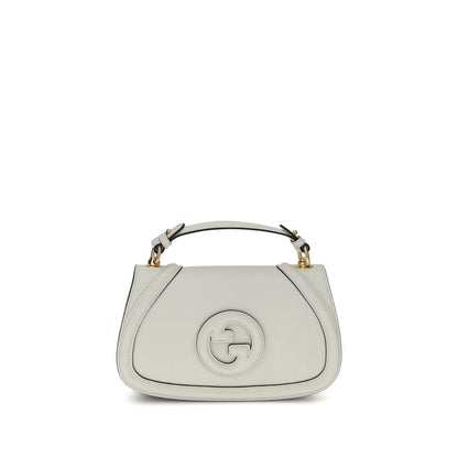 Gucci White Calf Leather Bos Taurus Handbag with tonal leather GG applique on front, featuring removable handle and adjustable shoulder strap.