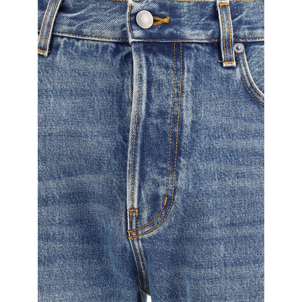 Close-up of Haikure Blue Cotton Straight-Leg Jeans with button closure and vintage pattern, featuring five-pocket design and belt loops.