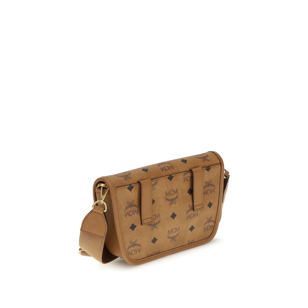 MCM Brown Fabric Shoulder Bag with logo print, rectangular shape, and structured front, featuring elegant craftsmanship and sophisticated design.