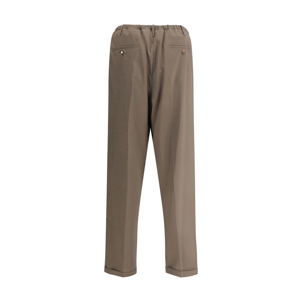Rear view of Magliano Brown Polyester Casual Pants featuring elastic waistband and baggy-cut hem.
