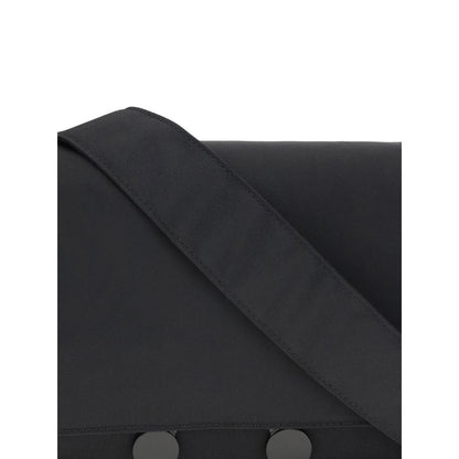 Close-up of Marni Black Polyamide Clutch Bag showing strap and buttons, highlighting the sleek urban design and durable material.