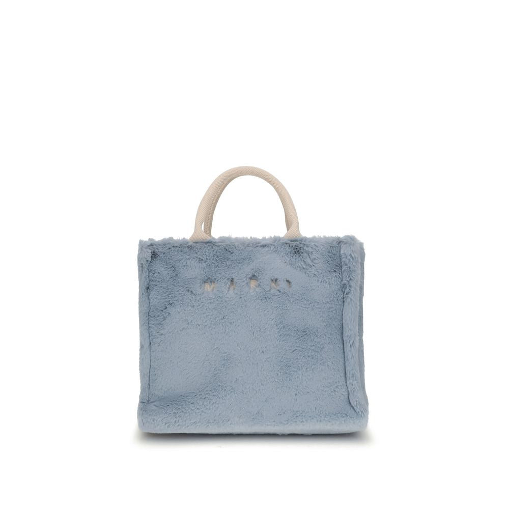 Marni Light Blue Polyester Handbag with fur lining and bold contemporary design, featuring Marni logo and multiple carrying options.
