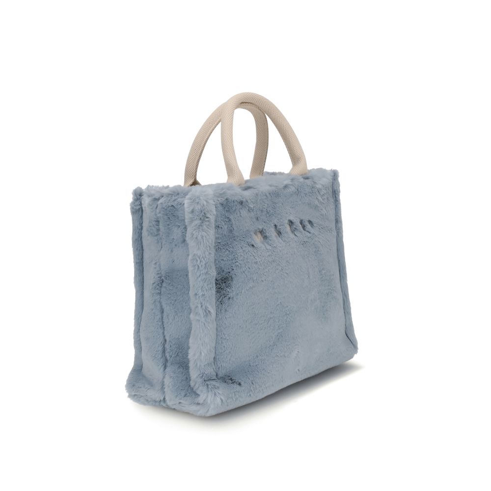 Marni Light Blue Polyester Handbag with fur lining, fabric handles, and logo, perfect as a versatile and stylish basket tote bag.