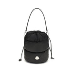Moncler Caradoc Bucket Bag in black water-repellent nylon with adjustable leather straps and drawstring closure.