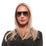 Woman wearing POLICE MOD. SPL740 62579B sunglasses with UV protection, official box packaging. Ideal for ladies.