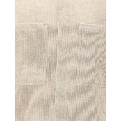 Close-up of patch pockets on Rick Owens Cream Cotton Shirt with corduroy texture, classic collar, and front button closure for AW25 season.