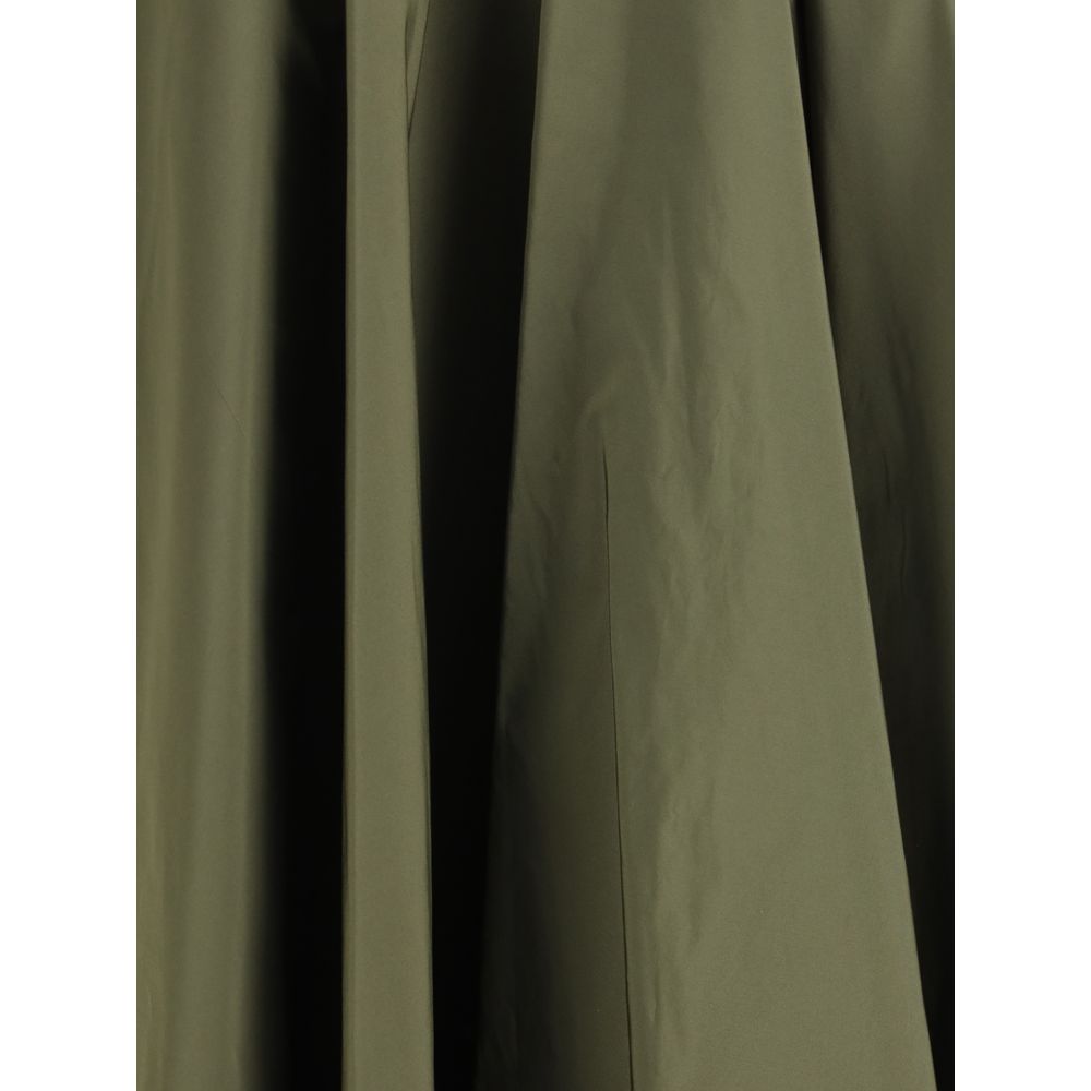 Sara Roka Green Polyester Midi Skirt with flowing line and side zipper, featuring two front welt pockets for a tailored look.