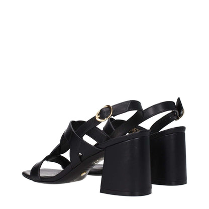 Stuart Weitzman Black Leather Platform Sandals with buckle closure and mid heels, featuring a stylish open toe design for casual wear.