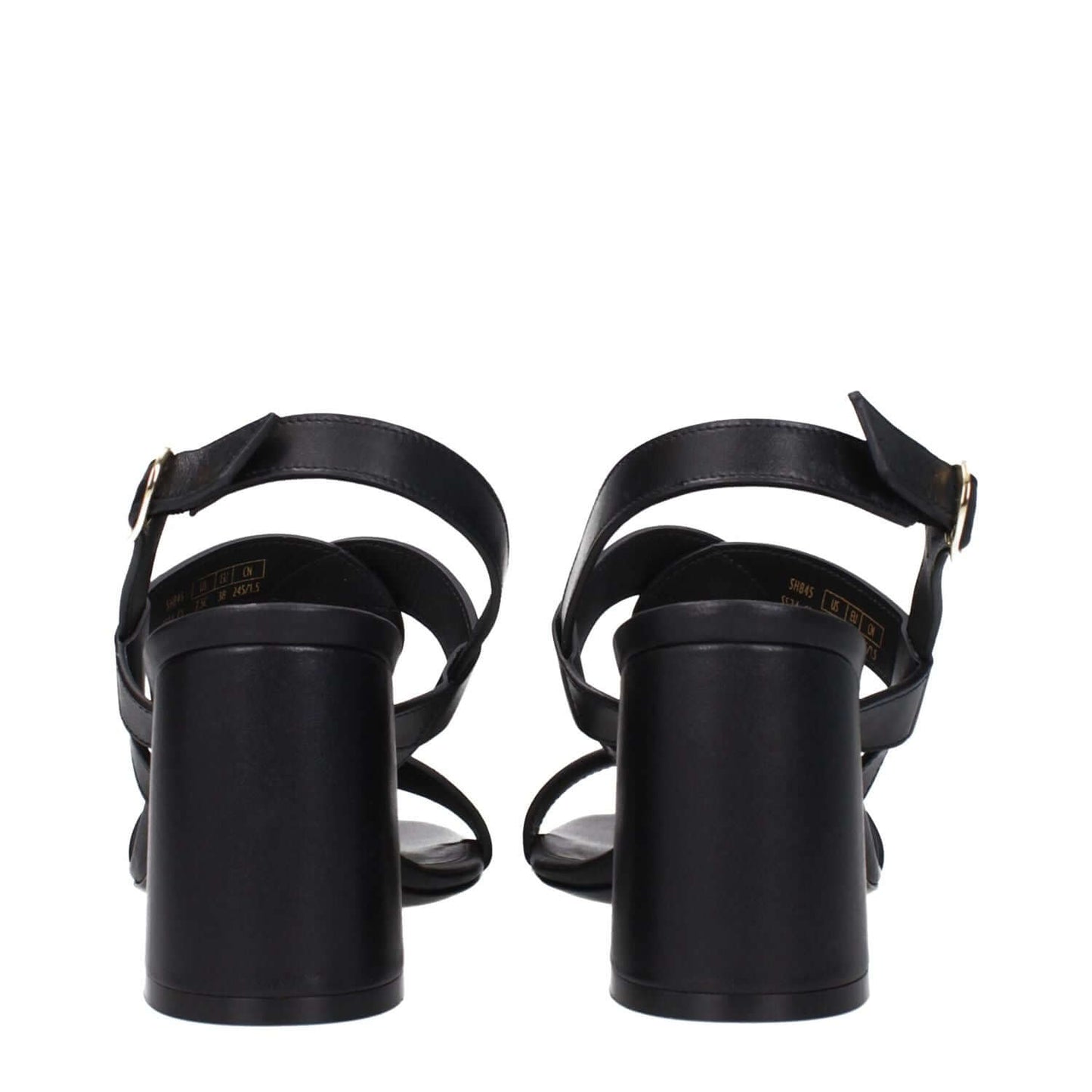 Rear view of Stuart Weitzman Black Leather Platform Sandals with buckle closure and mid heels.