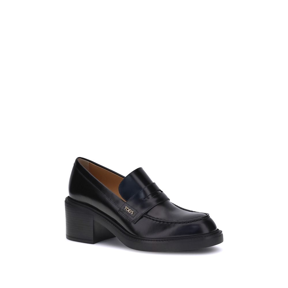 Tod's Black Calf Leather Bos Taurus Platform Loafers with chunky heel and round toe, showcasing contemporary style and elegance.