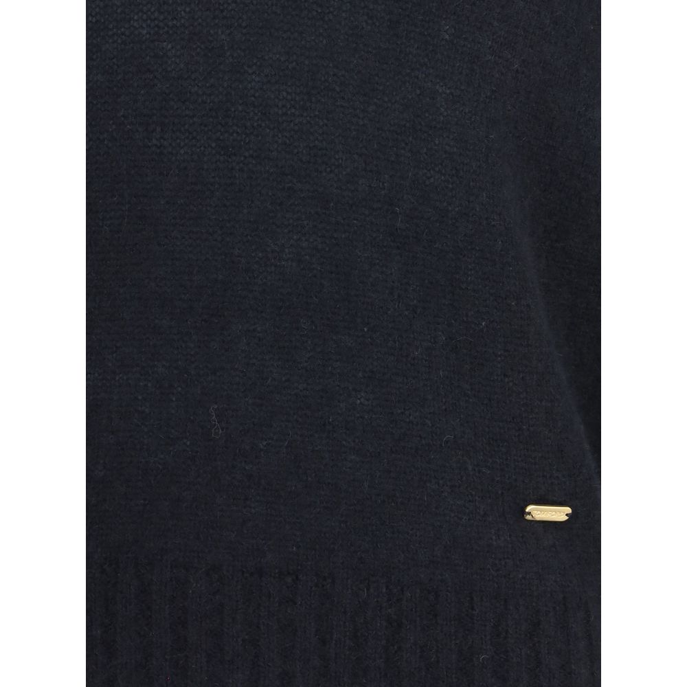 Tom Ford Black Cashmere Cashmere Sweater with ribbed hem, perfect for sophisticated yet relaxed looks, featuring wool and silk blend.