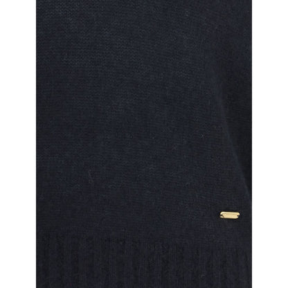 Tom Ford Black Cashmere Cashmere Sweater with ribbed hem, perfect for sophisticated yet relaxed looks, featuring wool and silk blend.