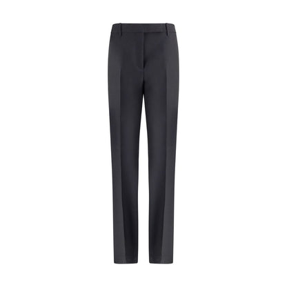 Tom Ford Black Wool Pants with high waist and center pleat, made of wool gabardine, mohair, and silk, featuring a hook-and-eye front closure.