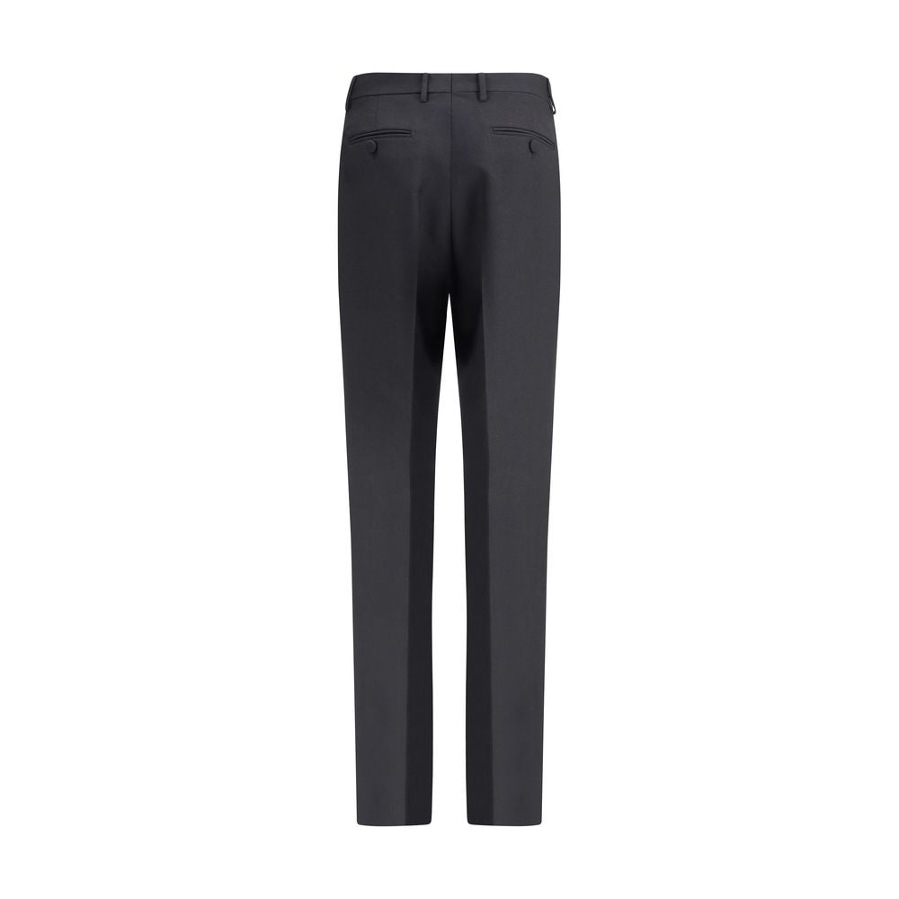 Tom Ford Black Wool Pants featuring high waist, center pleat, and multiple pockets for AW25. Made of fine wool gabardine, mohair, and silk.