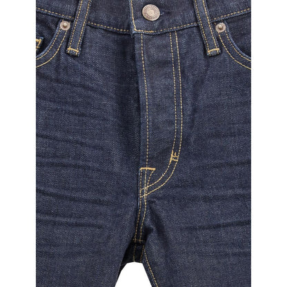 Close-up of Tom Ford Blue Cotton Straight-Leg Jeans showcasing button closure and classic 5-pocket design in selvedge denim.