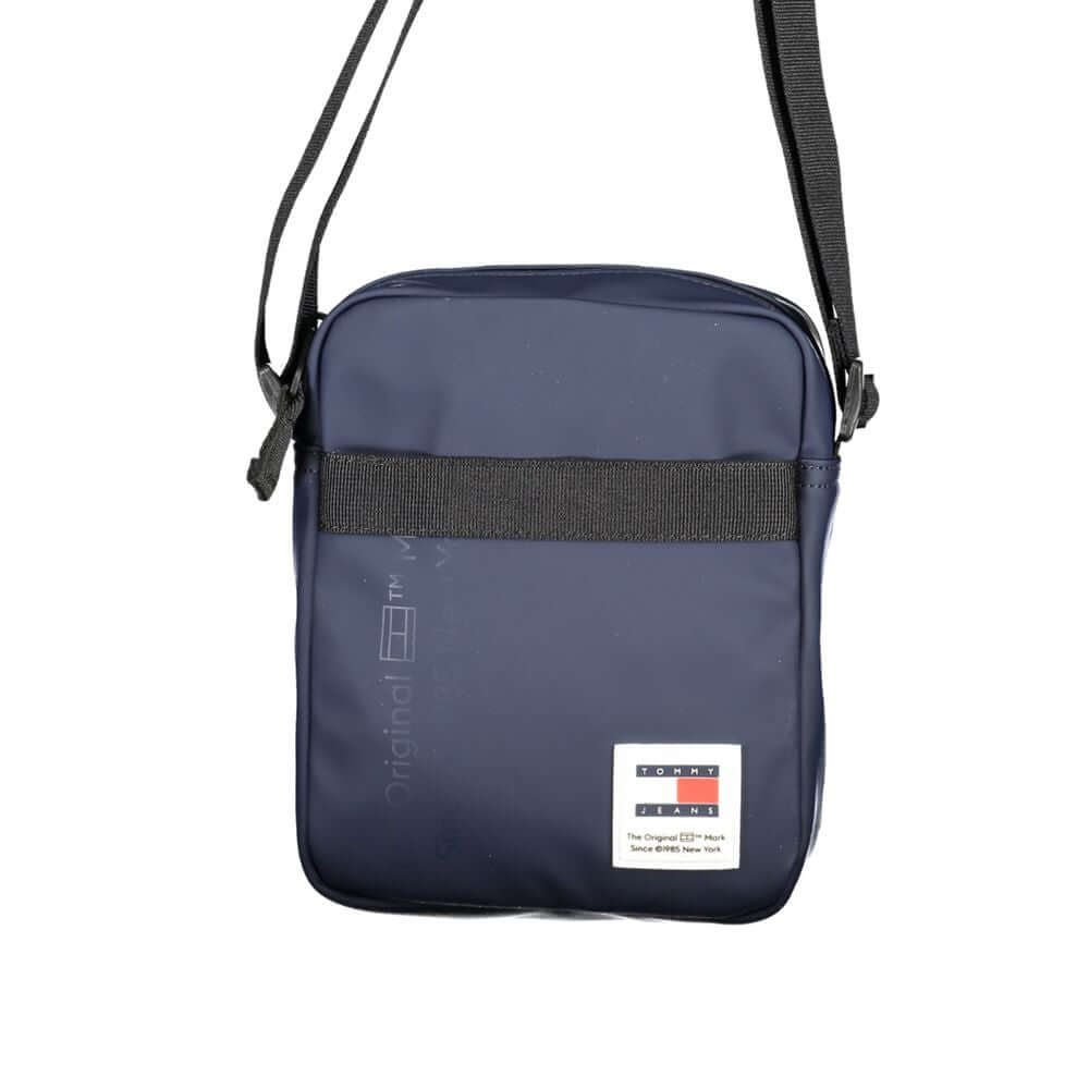 Front view with bag zipped and handles upright.