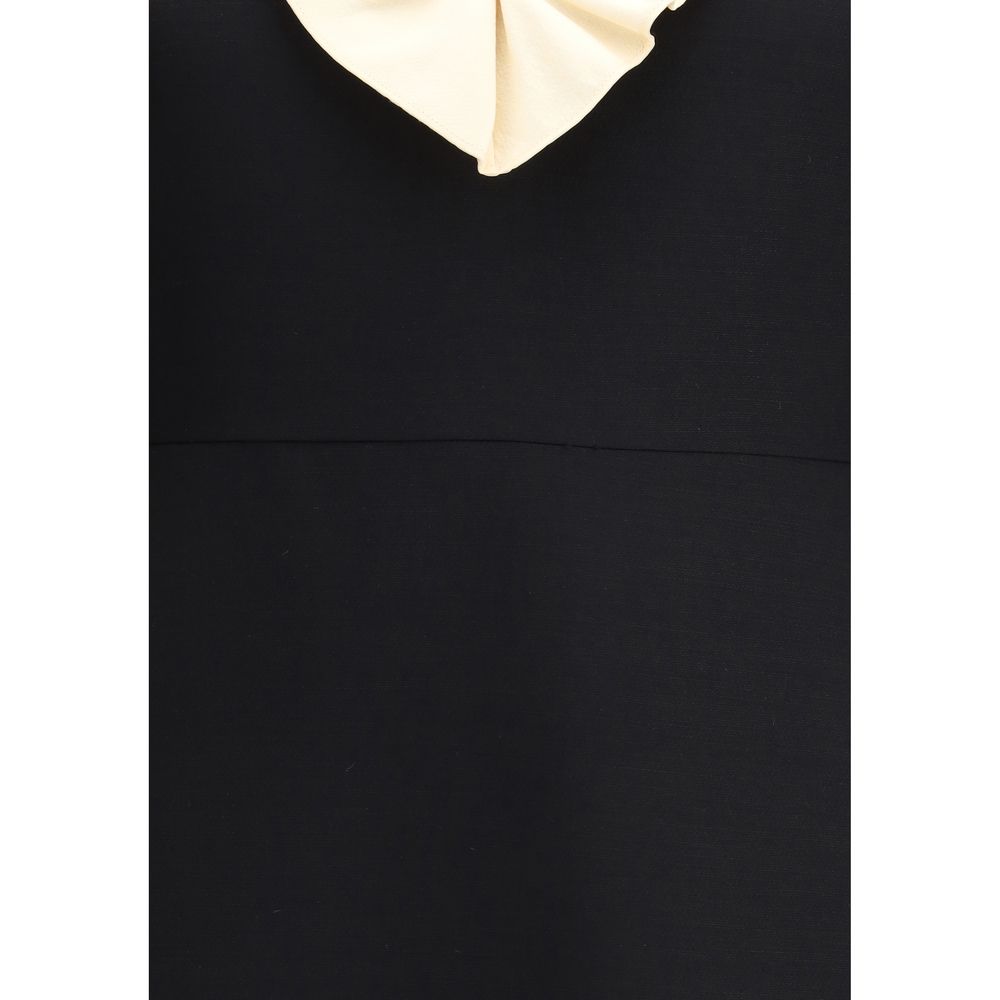 Valentino Black Fleece Wool Cocktail Dress with voile detail and deep V-neckline, featuring elegant silk and wool blend.