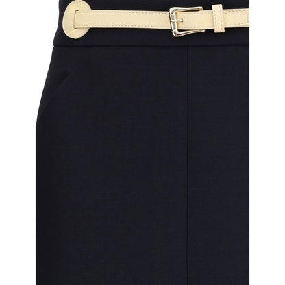 Close-up of Valentino Black Fleece Wool Midi Skirt with built-in leather belt and side welt pocket detail.