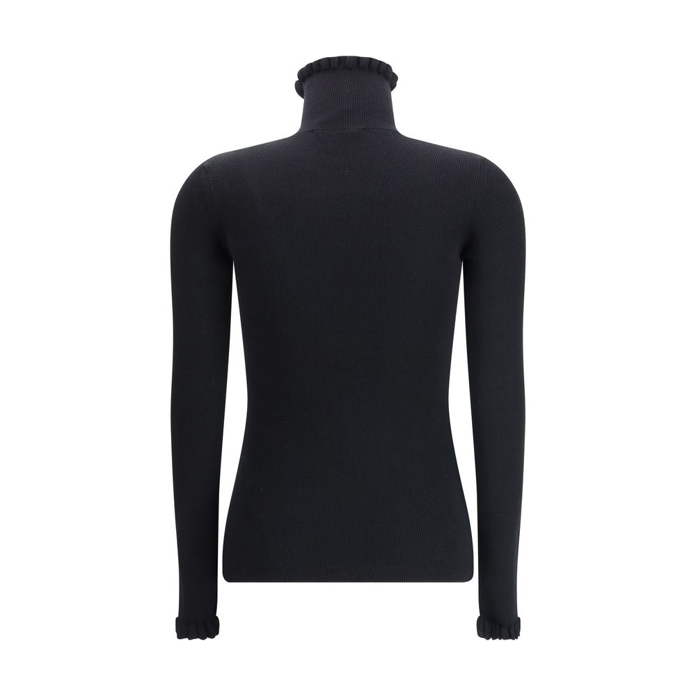 Back view of Valentino Black Fleece Wool Sweatshirt with ruffled collar and cuffs, featuring embroidered logo for an elegant touch.