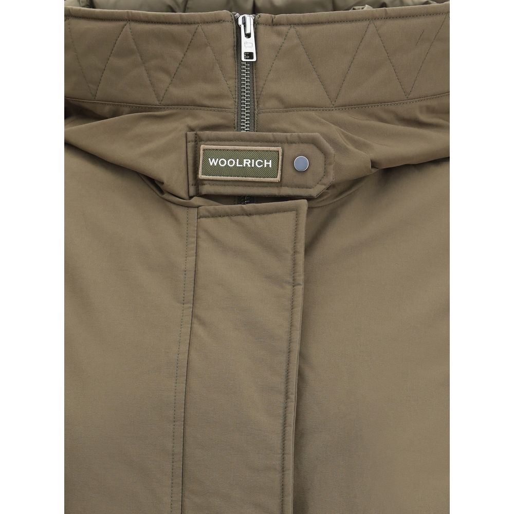 Close-up of Woolrich Green Cotton Parka with high collar, quilted design, and zipper closure.