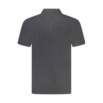 Back view of a Wrangler Black Cotton Polo Shirt featuring short sleeves, a 3-button design, and a logo application.
